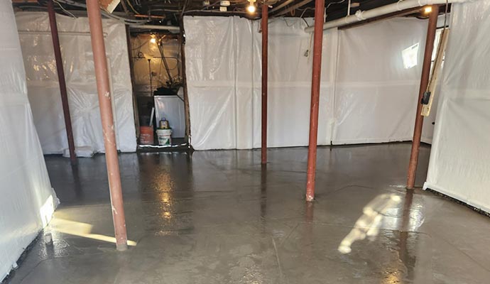 basement waterproofing in progress