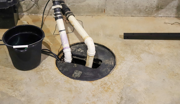 Sump pump installed in the crawl space