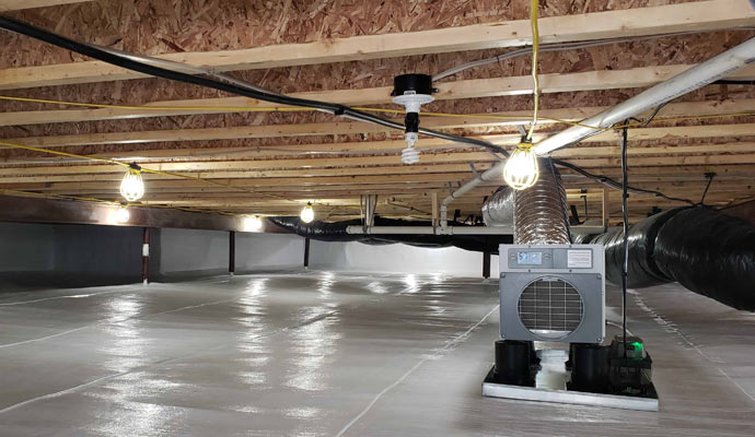 Dehumidification system installed in the basement