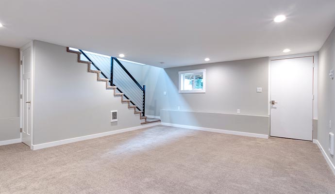 light spacious basement area with staircase basement waterproofing and renovations