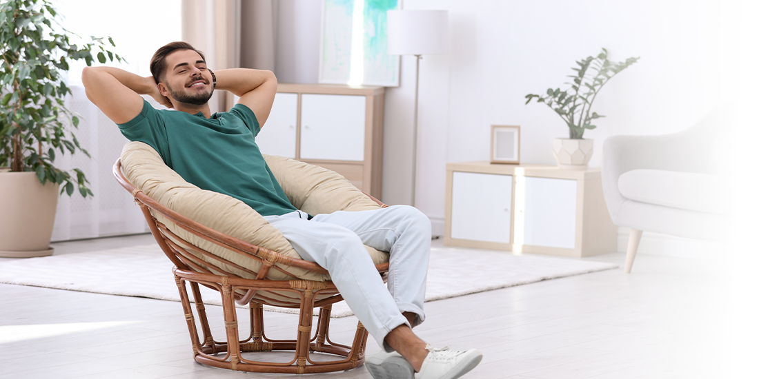 Man relaxing on sofa