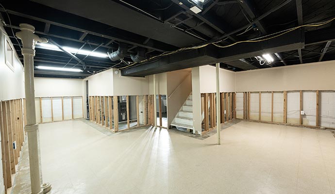 a basement with polished concrete finish